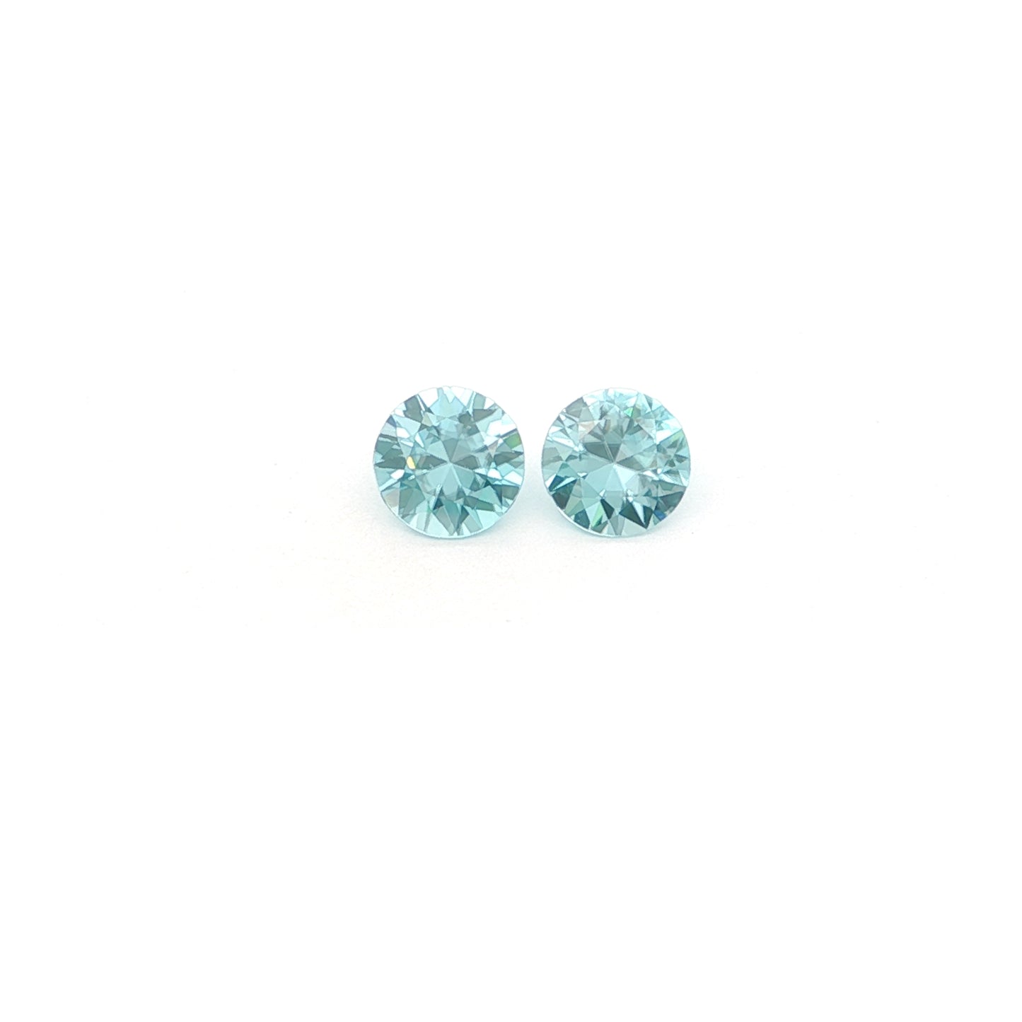 Blue Zircon Round Matched Pair 2.82ct (H) 6.5mm 90pct