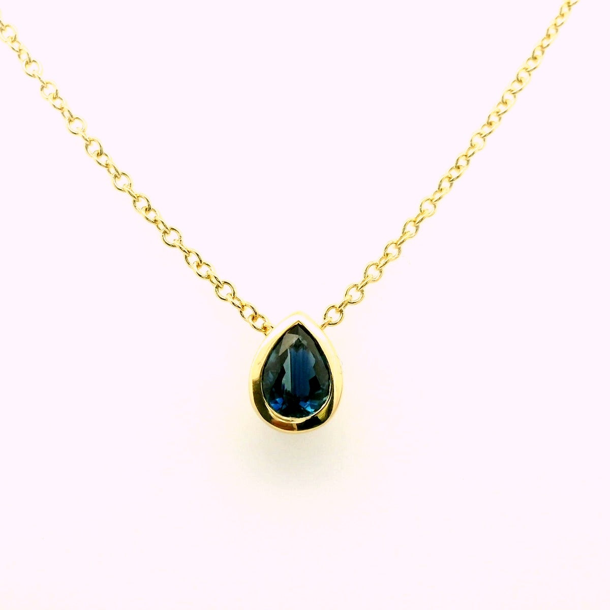 Blue Sapphire Pear Shape Bezel Necklace 0.75ct 18K Yellow Gold