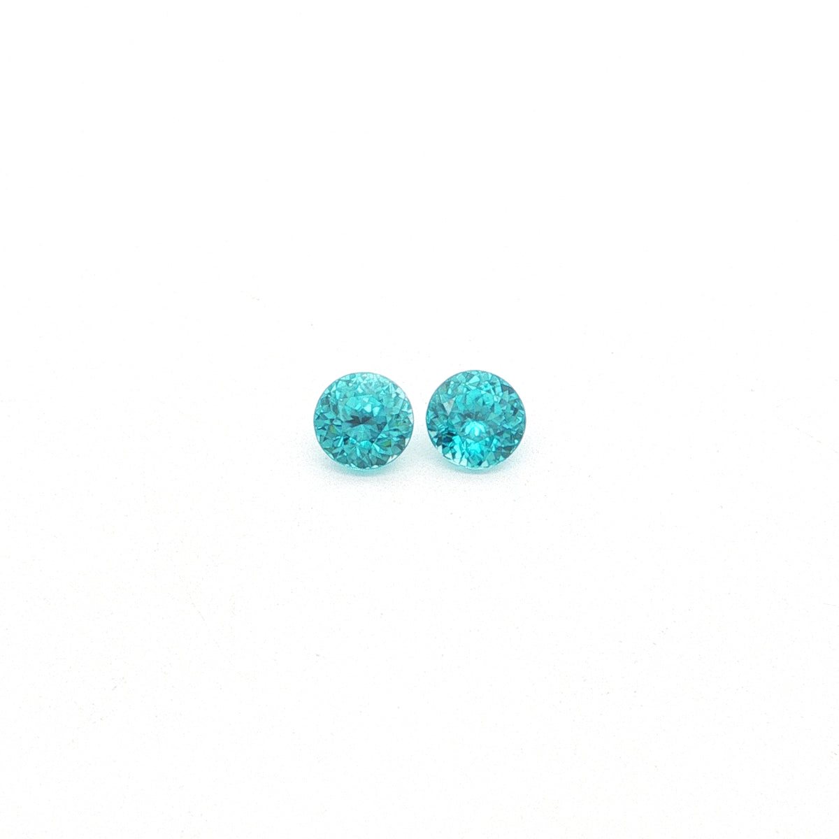 Blue Zircon Round Matched Pair 2.52ct (H) 5.7mm