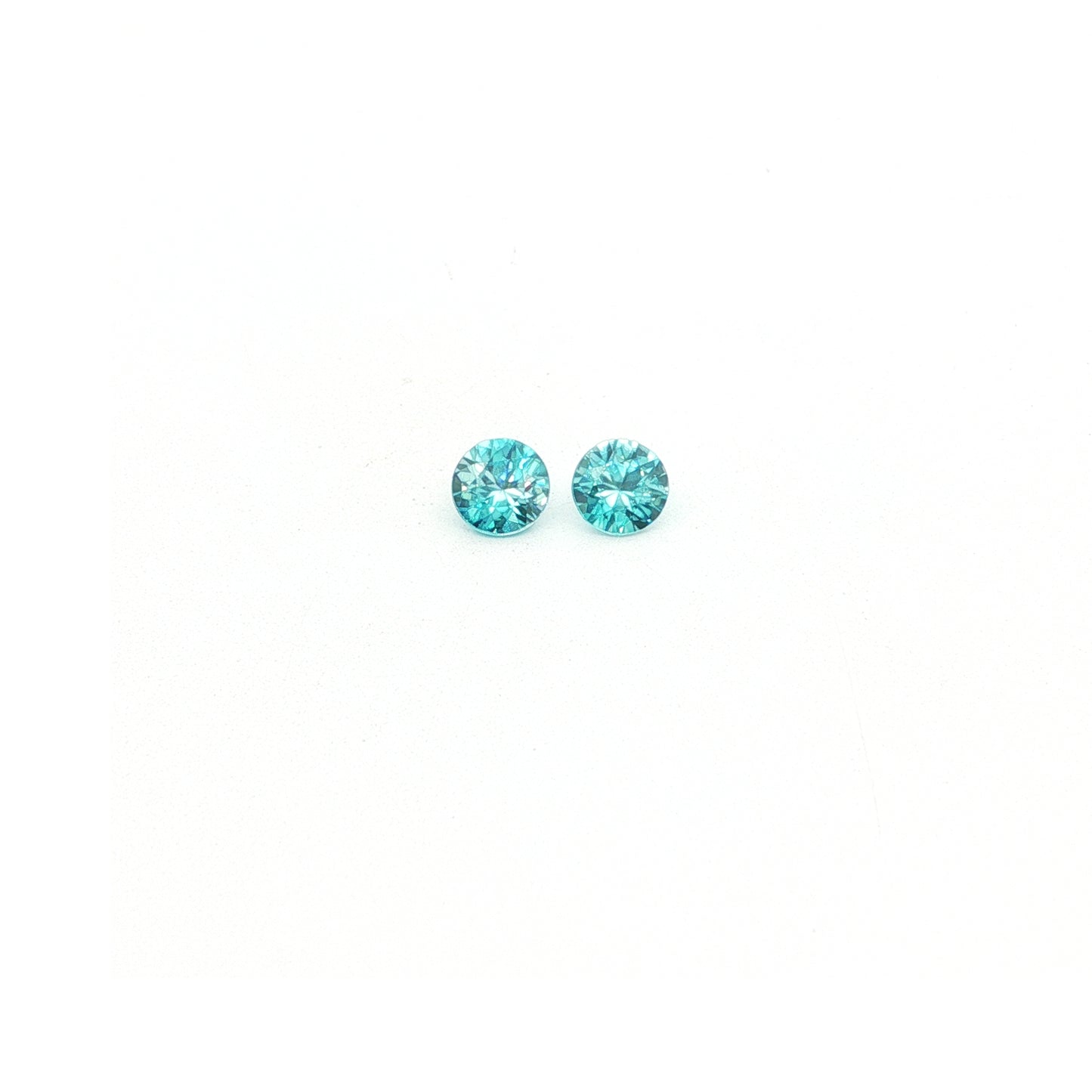 Cambodian Blue Zircon Round Matched Pair 1.01ct (H) 4.5mm 70pct
